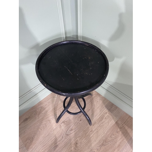 701 - Early 20th C. ebonised bentwood lamp table {75 cm H x 46 cm Dia.}.