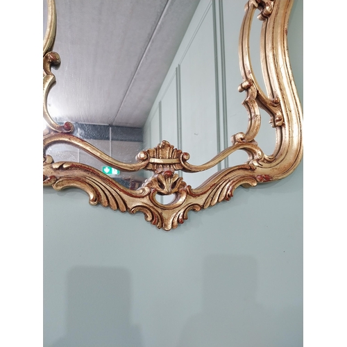 708 - French decorative gilt wall mirror {91 cm H x 61 cm W}.