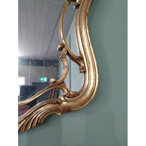 708 - French decorative gilt wall mirror {91 cm H x 61 cm W}.