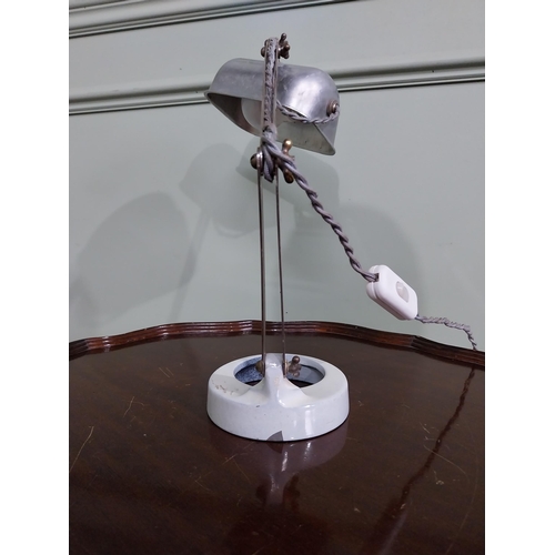 715 - Early 20th C. chrome desk lamp raised on ceramic base {40 cm H x 32 cm W x 20 cm D}.