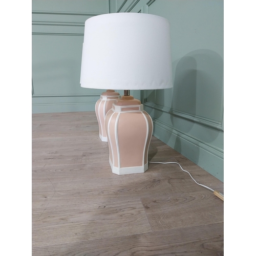 721 - Pair of painted terracotta table lamps with cloth shades {70 cm H x 42 cm Dia.}.