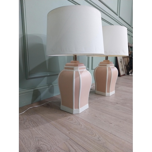 721 - Pair of painted terracotta table lamps with cloth shades {70 cm H x 42 cm Dia.}.