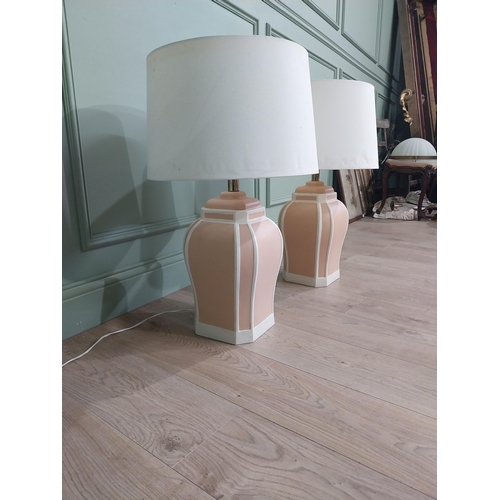 721 - Pair of painted terracotta table lamps with cloth shades {70 cm H x 42 cm Dia.}.