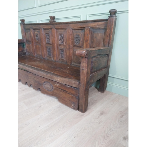 723 - 18th C. carved oak castle bench decorated with Lions and Castles {109 cm H x 206 cm W x 72 cm D}.