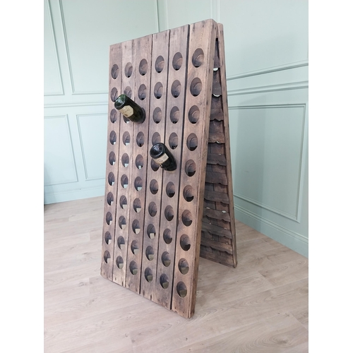 724 - Early 20th C. French oak Champagne rack {148 cm H x 72 cm W x 61 cm D}.