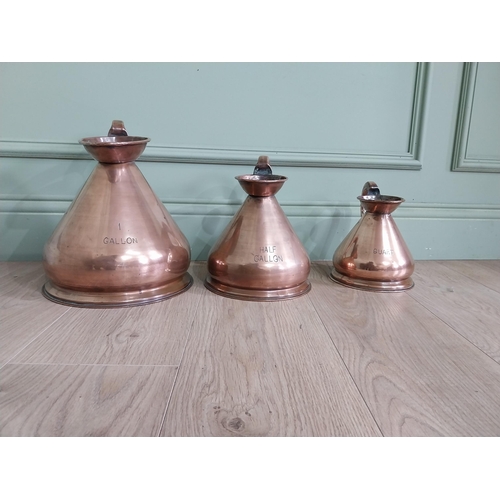 745 - Set of three 19th C. graduated copper measures {30 cm H x 30 cm W x 23 cm D and 20 cm H x 20 cm W x ... 