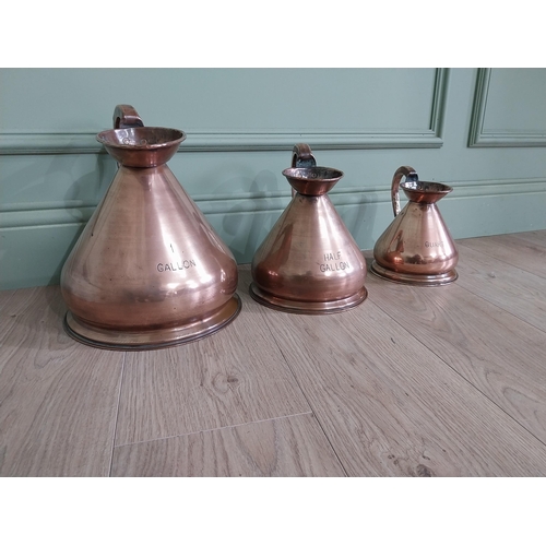 745 - Set of three 19th C. graduated copper measures {30 cm H x 30 cm W x 23 cm D and 20 cm H x 20 cm W x ... 