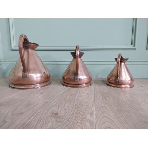 745 - Set of three 19th C. graduated copper measures {30 cm H x 30 cm W x 23 cm D and 20 cm H x 20 cm W x ... 