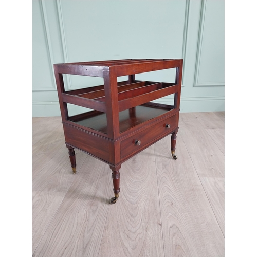 752 - Good quality 19th C. mahogany canterbury with single drawer raised on turned legs and brass castors ... 