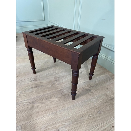 76 - Victorian mahogany luggage rack raised on turned legs {44 cm H x 57 cm W x 37 cm D}.