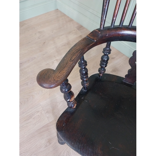 762 - 19th C. ash and elm Windsor arm chair raised on turned legs and two stretchers {113 cm H x 64 cm W x... 