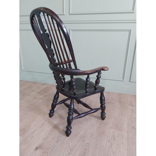 762 - 19th C. ash and elm Windsor arm chair raised on turned legs and two stretchers {113 cm H x 64 cm W x... 