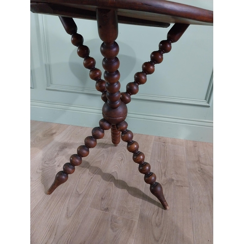 768 - 19th C. walnut bobbin wine table {65 cm H x 56 cm Dia.}.