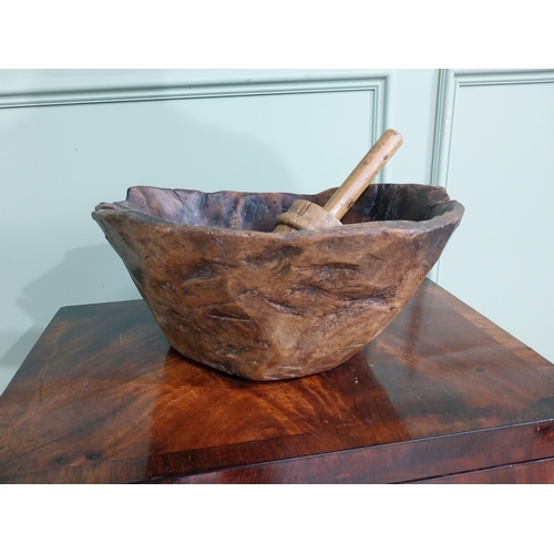 775 - 19th C. wooden bowl and pestle {17 cm H x 36 cm W x 37 cm D}.