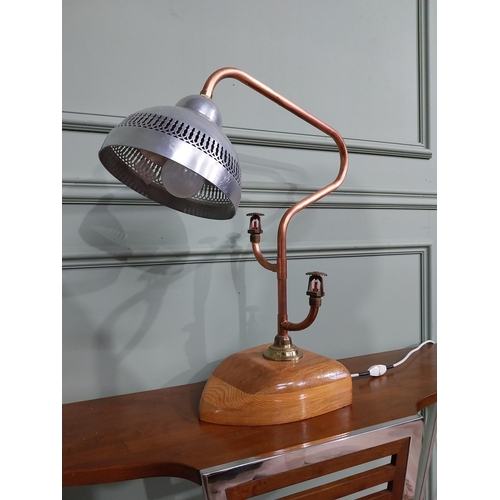 777 - Brass and copper Steam Punk table lamp mounted on oak plinth {57 cm H x 50 cm W x 20 cm D}.