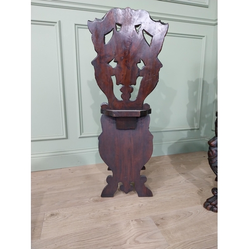 780 - Pair of 19th C.  carved walnut armorial hall chairs  {100 cm H x 40 cm W x 40 cm D}.