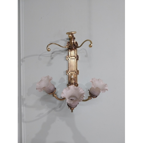 785 - Edwardian brass wall light with three tulip glass shades {55 cm H x 47 cm W x 39 cm D}.