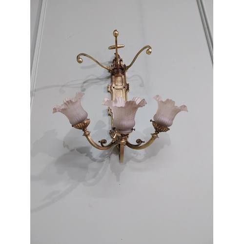 785 - Edwardian brass wall light with three tulip glass shades {55 cm H x 47 cm W x 39 cm D}.