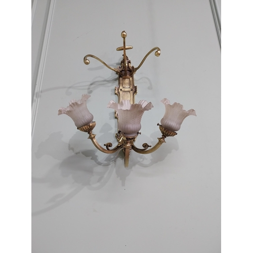 785 - Edwardian brass wall light with three tulip glass shades {55 cm H x 47 cm W x 39 cm D}.