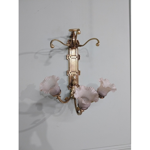 785 - Edwardian brass wall light with three tulip glass shades {55 cm H x 47 cm W x 39 cm D}.