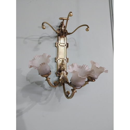 785 - Edwardian brass wall light with three tulip glass shades {55 cm H x 47 cm W x 39 cm D}.