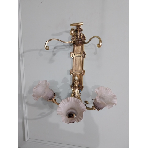 785 - Edwardian brass wall light with three tulip glass shades {55 cm H x 47 cm W x 39 cm D}.