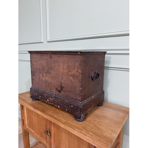 786 - 19th C. scumbled pine blanket box with lift up lid and wrought iron handles raised on bun feet {41 c... 