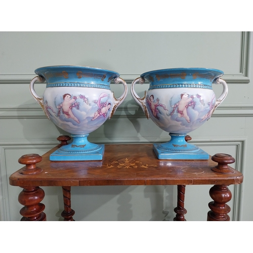 791 - Pair of good quality French hand painted ceramic jardinières decorated with Cherubs and swags {24 cm... 