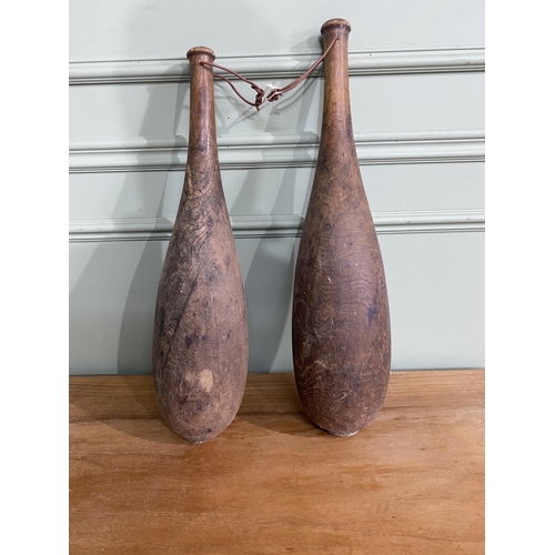 796 - Pair of 19th C. yew wood exercise dumbbells {64 cm H and 60 cm H}.