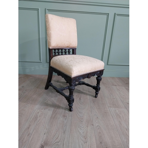 819 - Edwardian ebonised and upholstered chair raised on turned legs {92 cm H x 52 cm W x 64 cm D}.