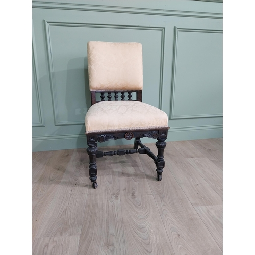 819 - Edwardian ebonised and upholstered chair raised on turned legs {92 cm H x 52 cm W x 64 cm D}.