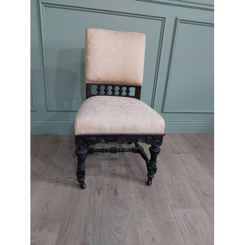 819 - Edwardian ebonised and upholstered chair raised on turned legs {92 cm H x 52 cm W x 64 cm D}.