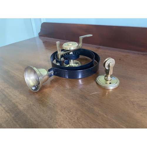 82 - Brass and wrought iron house bell {25 cm H x 16 cm W x 10 cm D}.