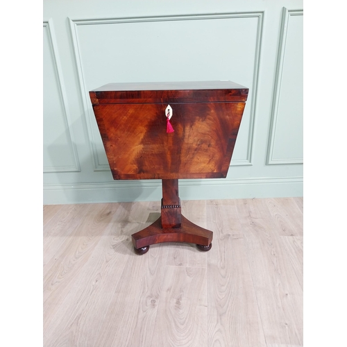 831 - Georgian flamed mahogany cellarette with fitted interior raised on square column and platform base {... 