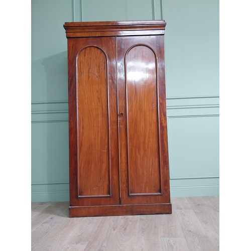 852 - 19th C. mahogany arched wardrobe with two doors {207 cm H x 111 cm W x 54 cm D}.