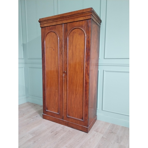 852 - 19th C. mahogany arched wardrobe with two doors {207 cm H x 111 cm W x 54 cm D}.