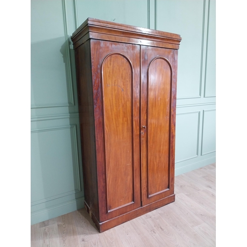 852 - 19th C. mahogany arched wardrobe with two doors {207 cm H x 111 cm W x 54 cm D}.