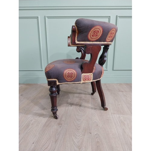 855 - Victorian mahogany and upholstered armchair raised on turned legs and brass castors {78 cm H x 77 cm... 