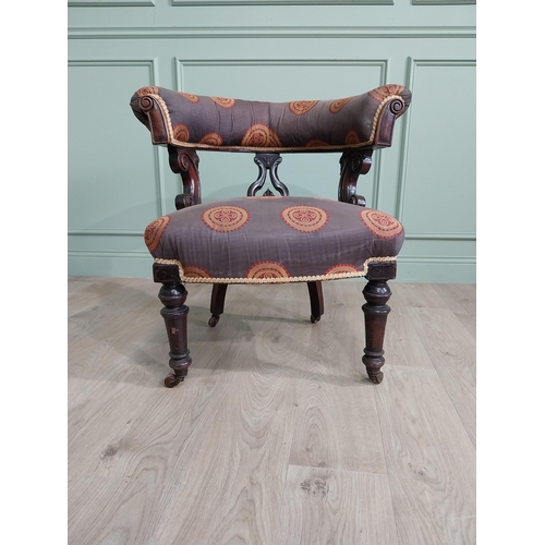 855 - Victorian mahogany and upholstered armchair raised on turned legs and brass castors {78 cm H x 77 cm... 