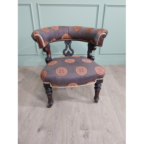 855 - Victorian mahogany and upholstered armchair raised on turned legs and brass castors {78 cm H x 77 cm... 