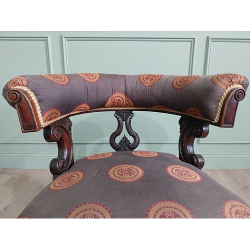 855 - Victorian mahogany and upholstered armchair raised on turned legs and brass castors {78 cm H x 77 cm... 