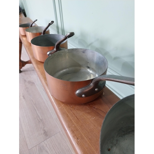 862 - Set of five good quality graduated French copper saucepans with wrought iron handles {18 cm H x 25 c... 