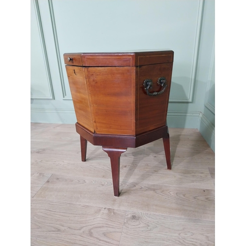 866 - Georgian mahogany and satinwood inlaid cellarette with original liner raised on square tapered legs ... 