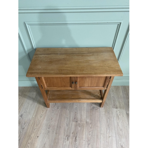 871 - Good quality oak side cabinet with two blind doors above single drawers raised on square legs {79 cm... 