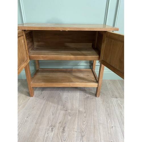 871 - Good quality oak side cabinet with two blind doors above single drawers raised on square legs {79 cm... 