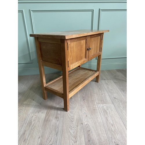 871 - Good quality oak side cabinet with two blind doors above single drawers raised on square legs {79 cm... 