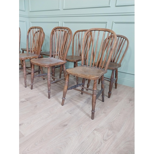 874 - Set of eight ash and elm kitchen chairs raised on turned legs {91 cm H x 37 cm W  x 45 cm D}.