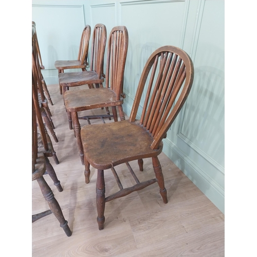 874 - Set of eight ash and elm kitchen chairs raised on turned legs {91 cm H x 37 cm W  x 45 cm D}.