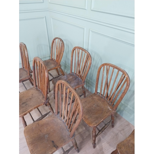 874 - Set of eight ash and elm kitchen chairs raised on turned legs {91 cm H x 37 cm W  x 45 cm D}.