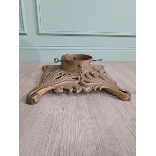 881 - Decorative cast iron Christmas tree stand {14 cm H x 44 cm W x 44 cm D}.